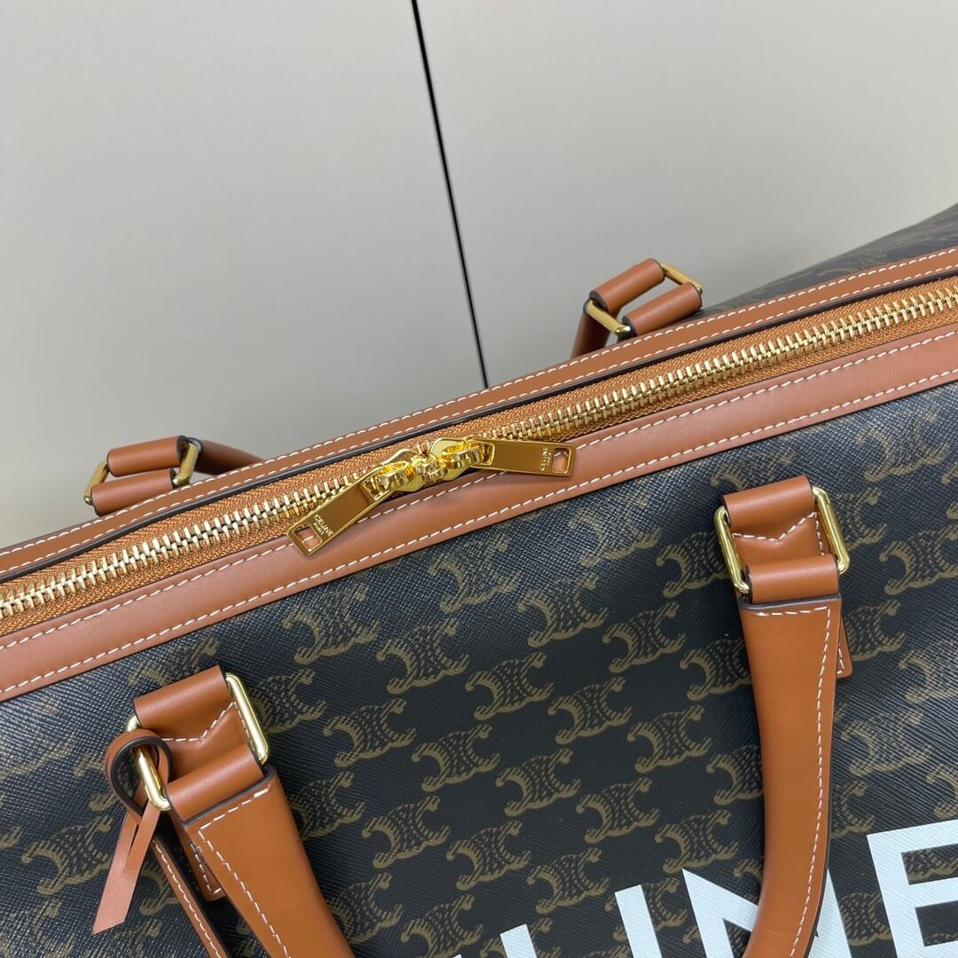 CELINE Medium duffle bag in logo-print calfskin