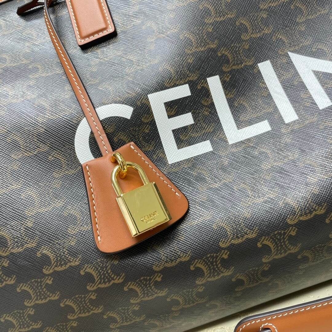 CELINE Medium duffle bag in logo-print calfskin