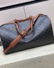 CELINE Medium duffle bag in logo-print calfskin
