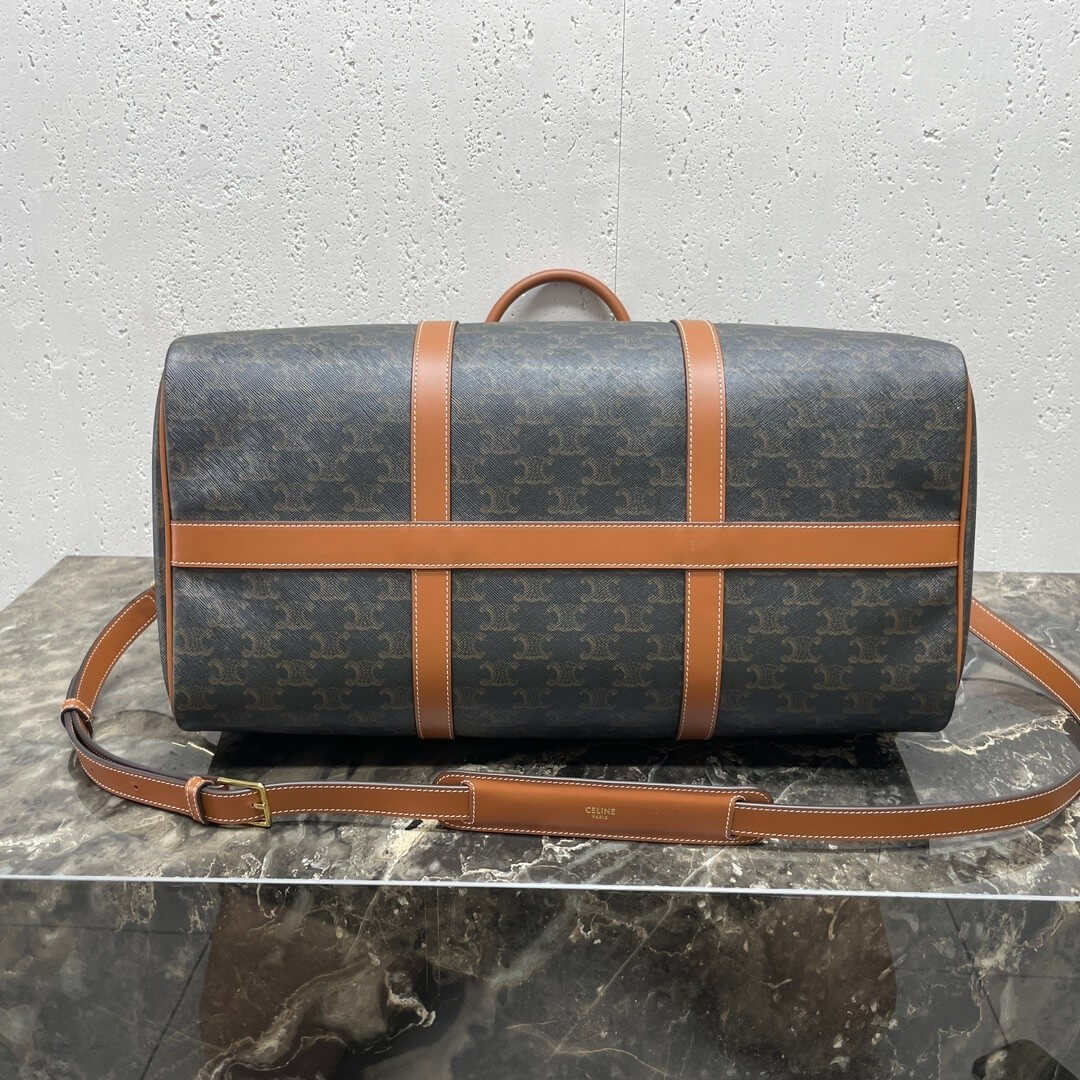 CELINE Medium duffle bag in logo-print calfskin