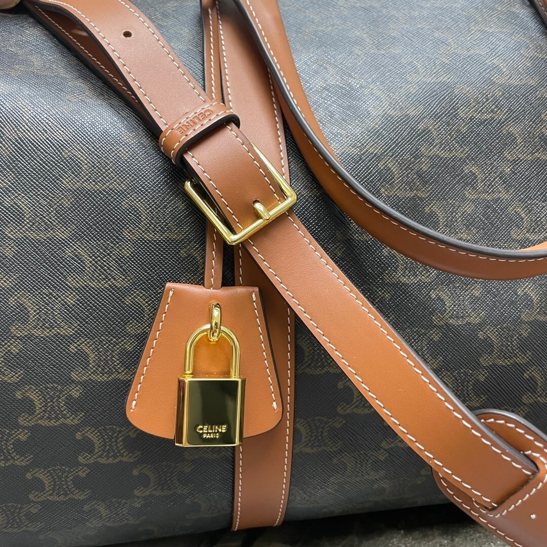 CELINE Medium duffle bag in logo-print calfskin