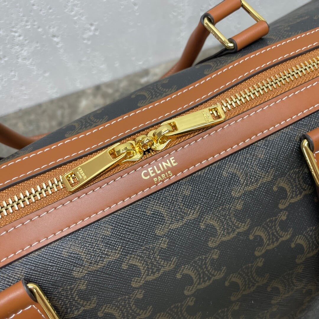 CELINE Medium duffle bag in logo-print calfskin