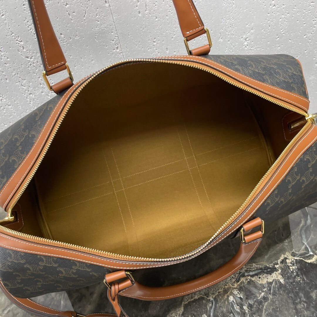 CELINE Medium duffle bag in logo-print calfskin
