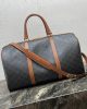 CELINE Medium duffle bag in logo-print calfskin