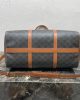CELINE Medium duffle bag in logo-print calfskin