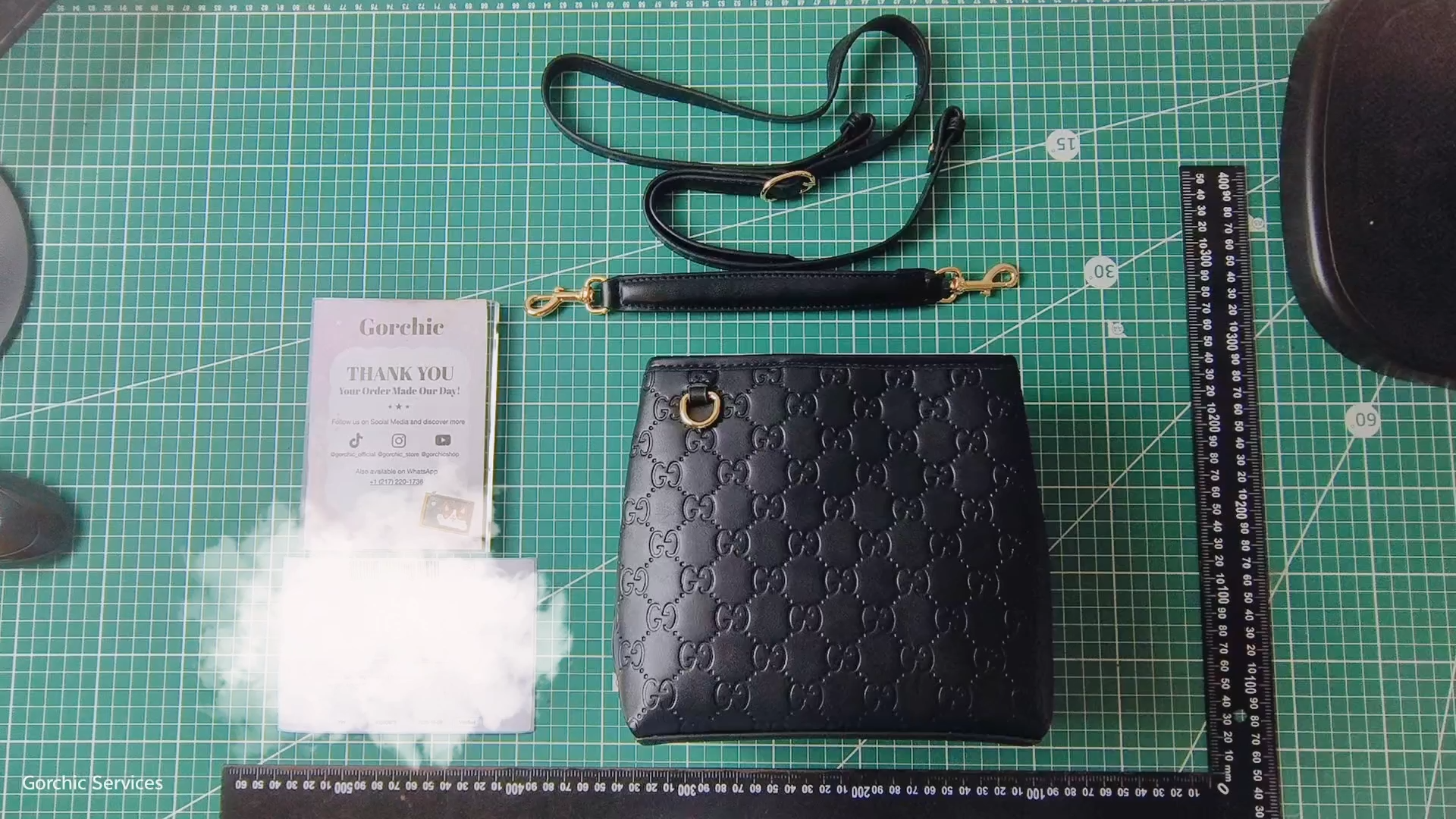 Gucci GG Emblem Small Bucket Bag GG Print Embossed Leather - Black