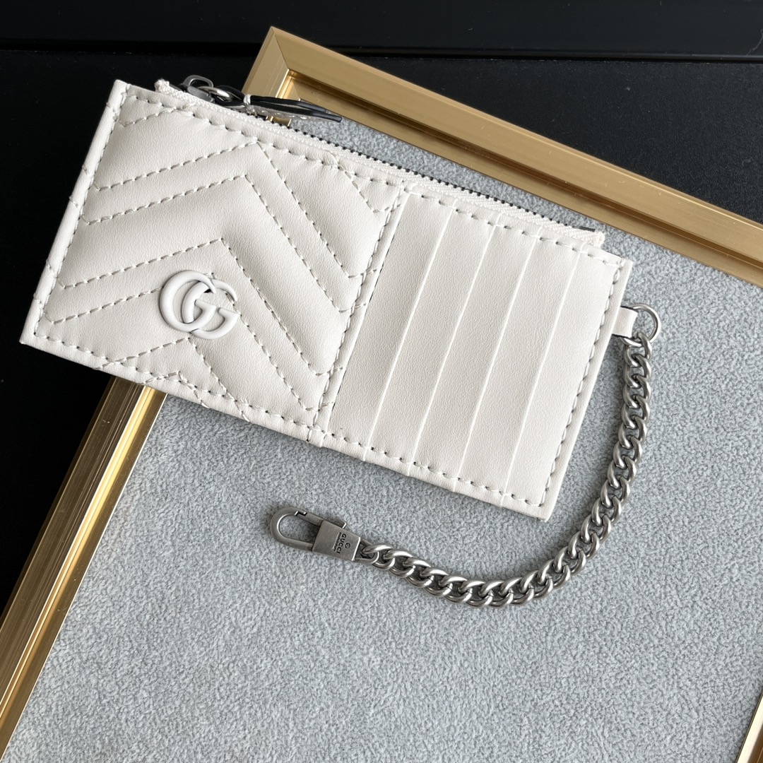 Gucci GG Marmont matelassé leather super mini bag