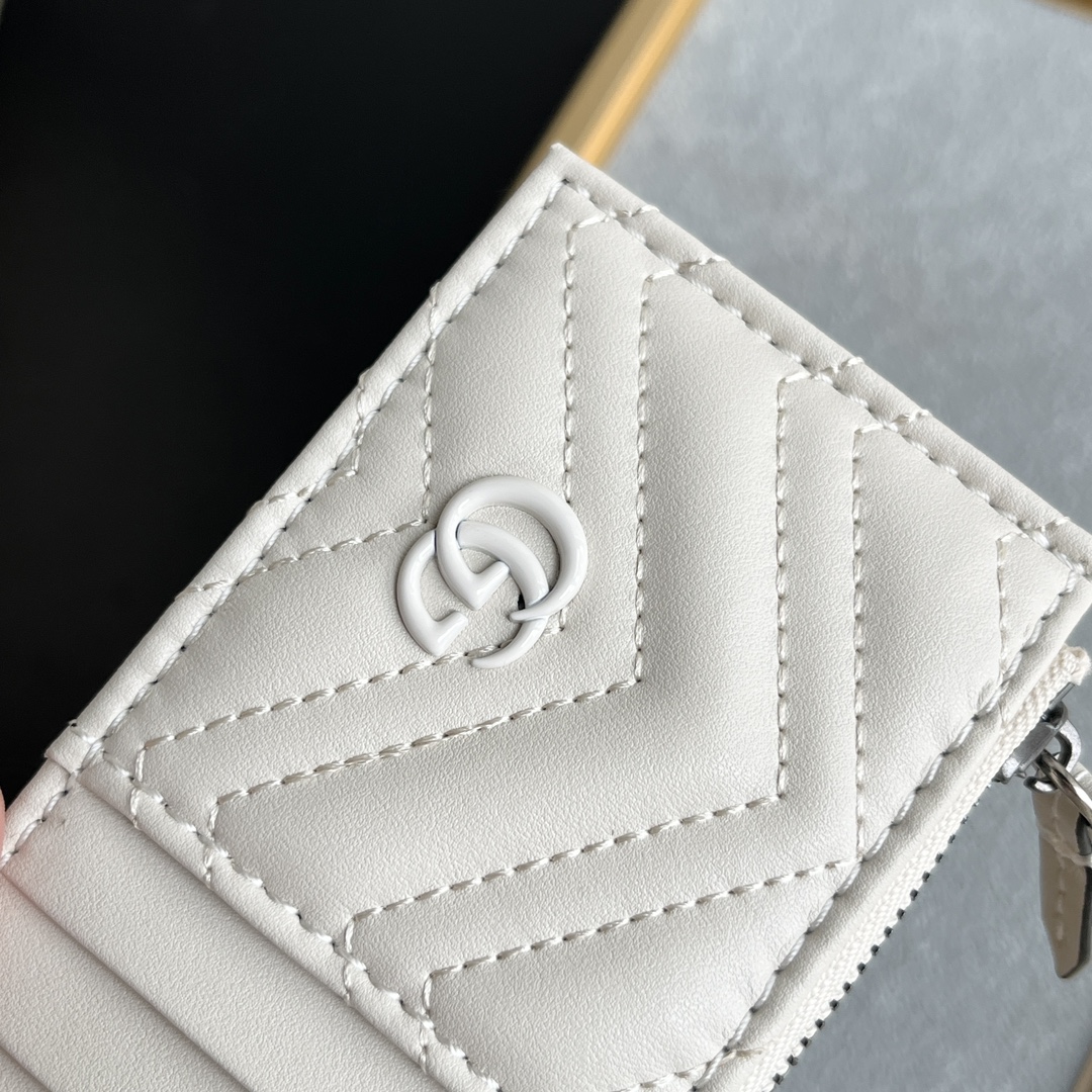 Gucci GG Marmont matelassé leather super mini bag