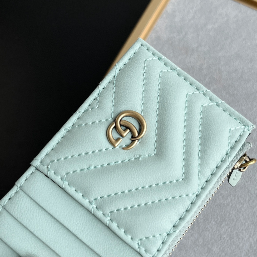 Gucci GG Marmont matelassé leather super mini bag