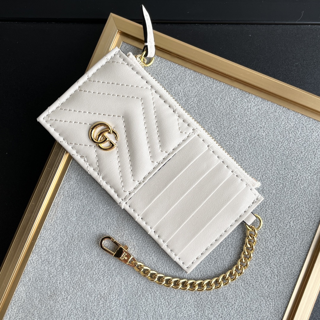 Gucci GG Marmont matelassé leather super mini bag