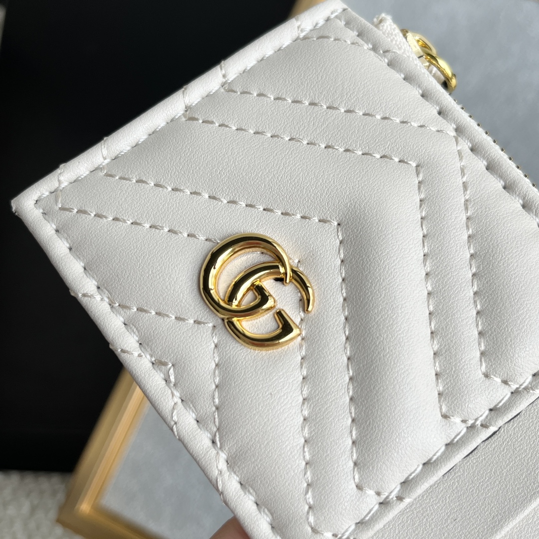 Gucci GG Marmont matelassé leather super mini bag