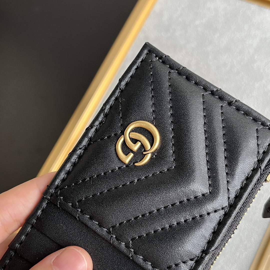 Gucci GG Marmont matelassé leather super mini bag
