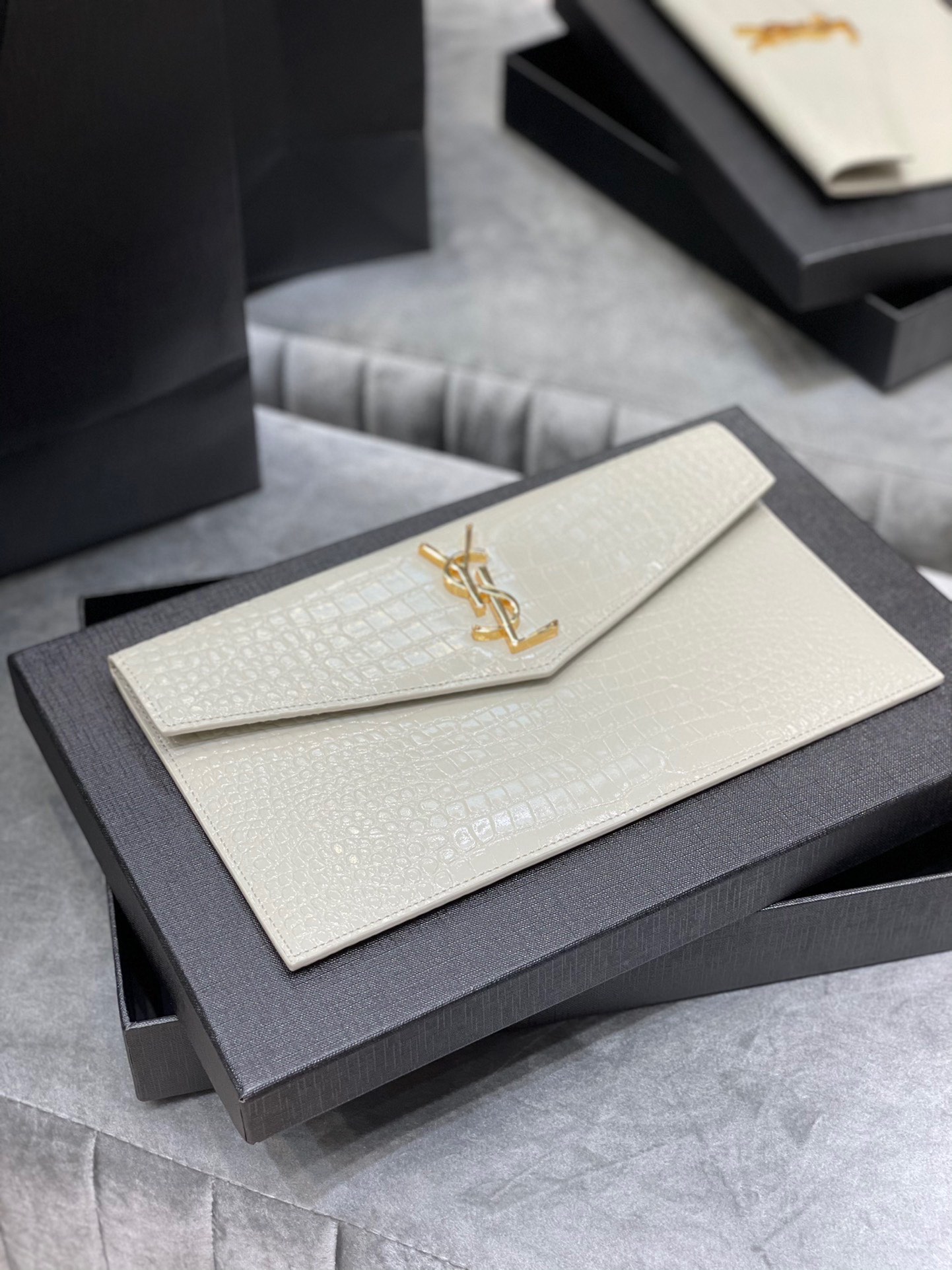 SAINT LAURENT Uptown POUCH IN CROCODILE-EMBOSSED SHINY LEATHER WHITE-GOLD HARDWARE - Bag
