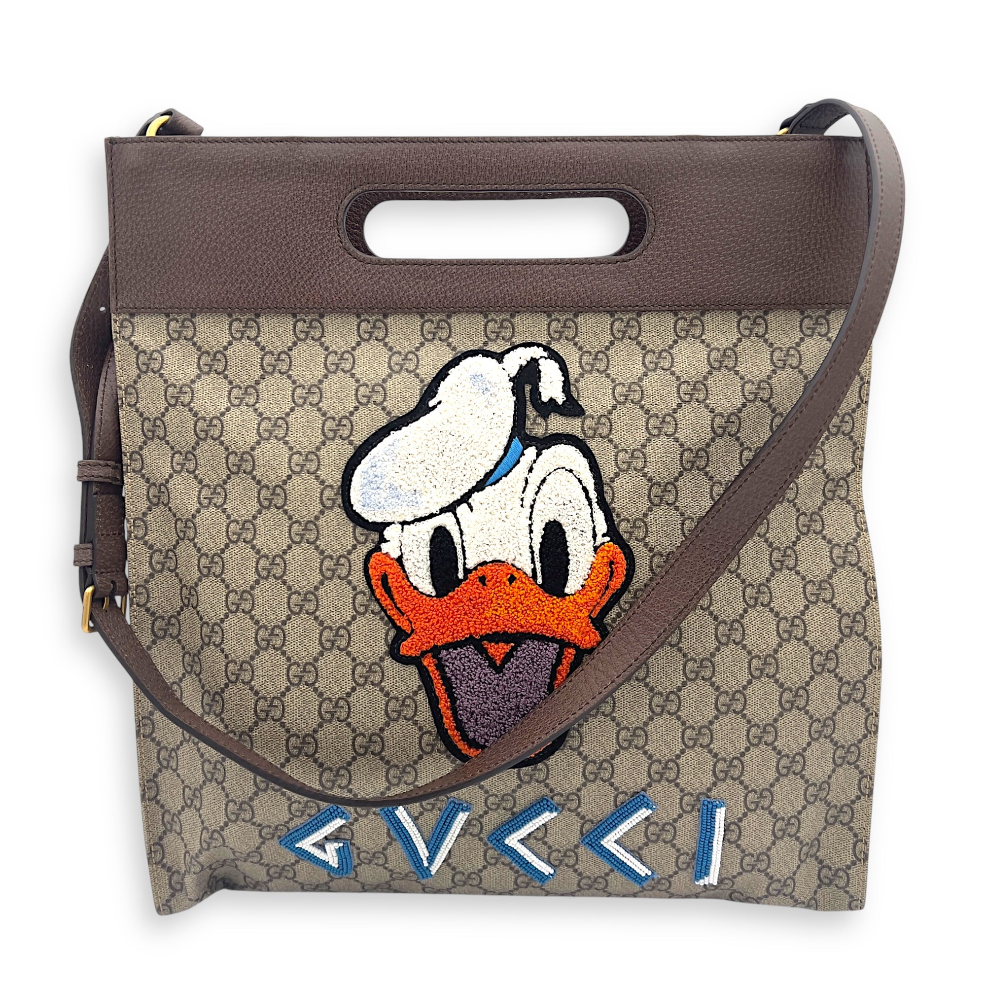 X Disney Donald Duck Soft GG Supreme Brown Top Handle Bag in Monogram Coated Canvas, Gold hardware
