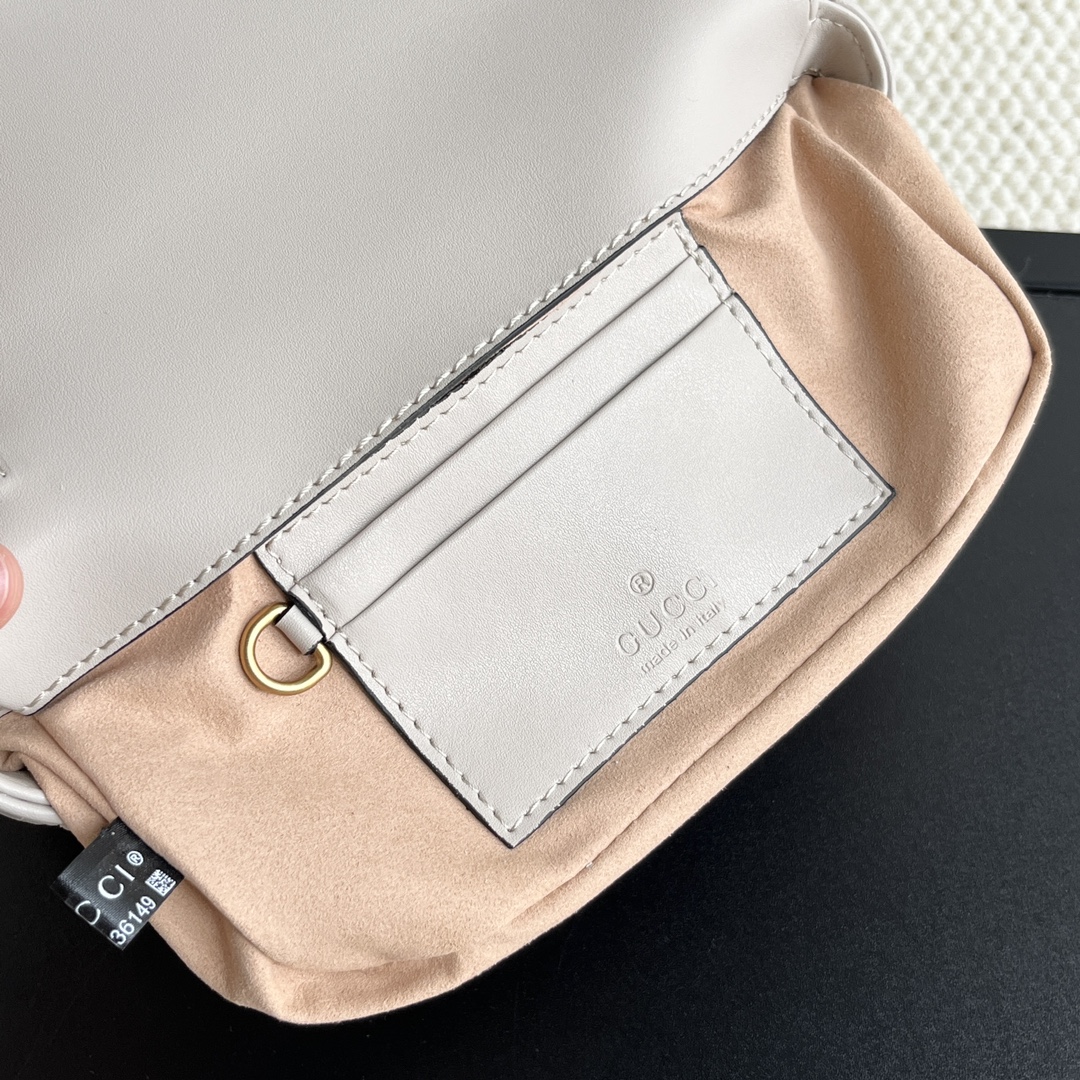 Gucci GG Marmont matelassé leather super mini bag